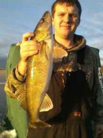 /album/ice-fishing-pictures/derricks-walleye-jpg/